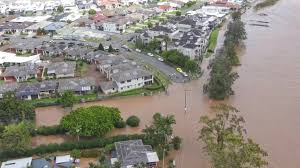 Thousands evacuated as record rain hits eastern Australian coast