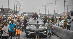 Cubana Chief Priest gifts boy who stood in front of Obi’s convoy scholarship