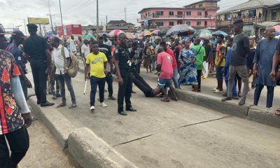 Mob beats Lagos policeman to stupor for pushing man crushed by BRT