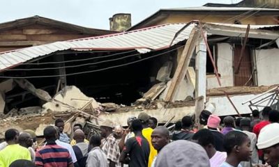 Scores trapped in collapsed building