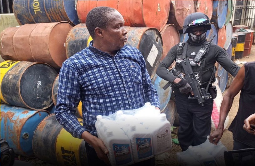 Two arrested as NSCDC uncovers illegal car lubricant production factory