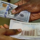Protest as naira exchanges at 208 to a dollar in 2015