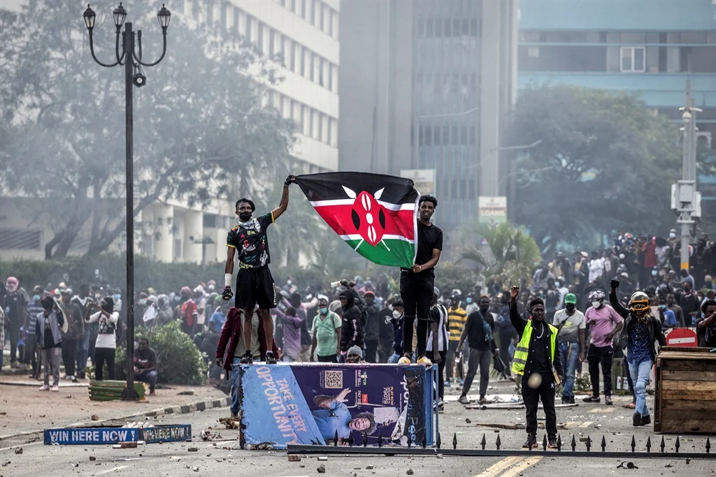 Several people feared killed as protesters set parliament building on fire