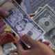 CBN to sanction banks, BDCs rejecting old dollar notes