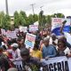 Police distribute sachet water to protesters in Adamawa
