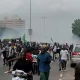 Police Fire Tear Gas at Protesters Near Eagles Square