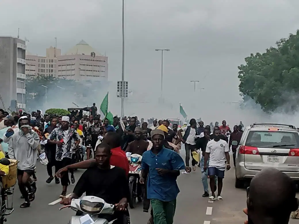 Police Fire Tear Gas at Protesters Near Eagles Square
