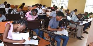 Students writing examinations