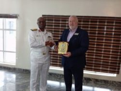FOC, Western Naval Command, Rear Adm. Michael Oamen, giving souvenir to Senior Directing Staff, British Royal College of Defence Studies, Rear Adm. Steve Dainton