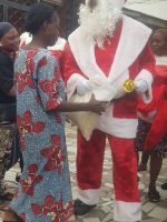 Yuletide: Desmond Elliott in santa costumes preaches love doles gifts to constituents