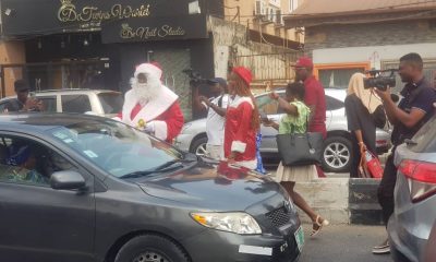 Yuletide: Desmond Elliott in santa costumes preaches love doles gifts to constituents