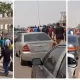 Chaos in Abuja as angry workers chase FCT Minister Wike’s convoy during back-gate exit