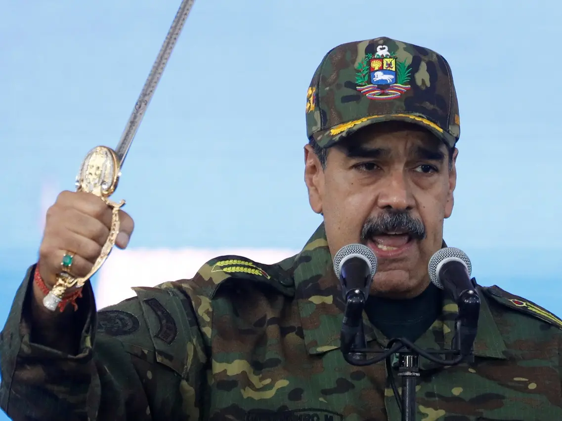 Venezuela accuses U.S. of attacks Aater explosions rock Caracas, bans flights over military activity