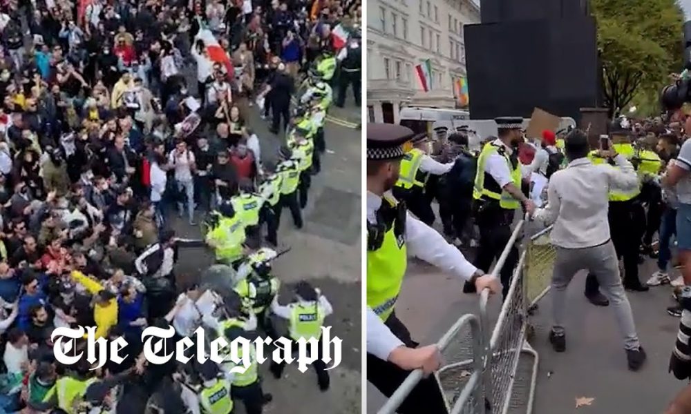 Four hospitalised as London protest outside Iranian embassy turns violent