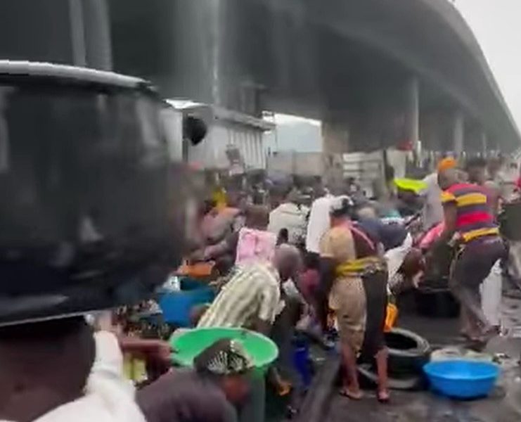 Lagos issues warning as residents scoop fuel from fallen tanker