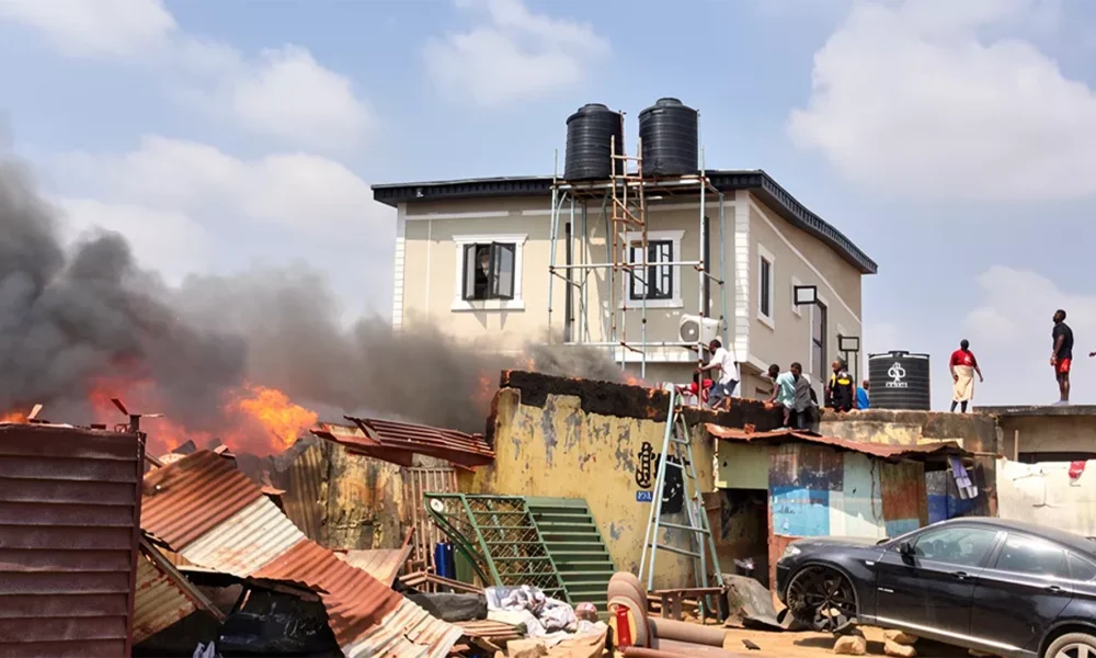 Panic in Lagos as residents, traders’ battle fire after explosion near Ojota Park
