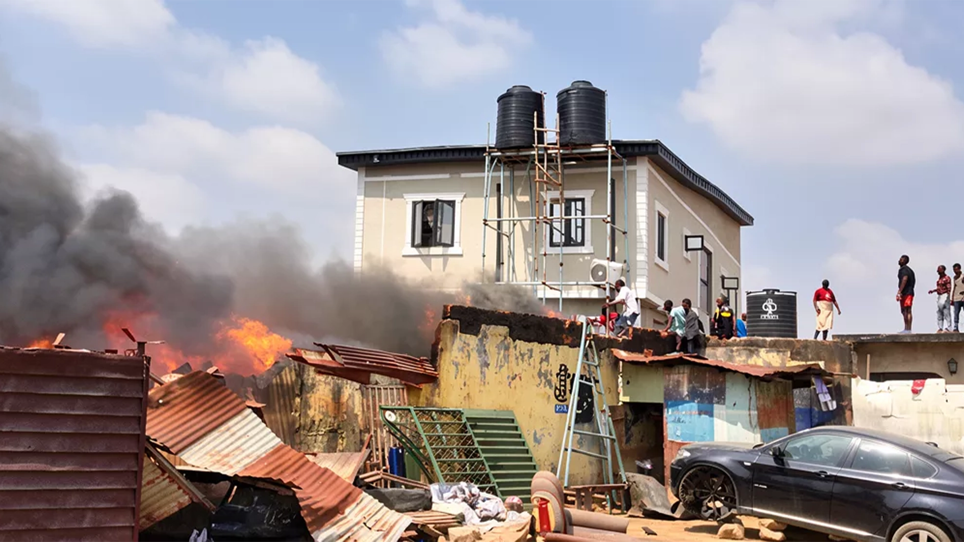 Panic in Lagos as residents, traders’ battle fire after explosion near Ojota Park