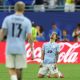Spain finish top of Group H as Uruguay crash out after Muslera error