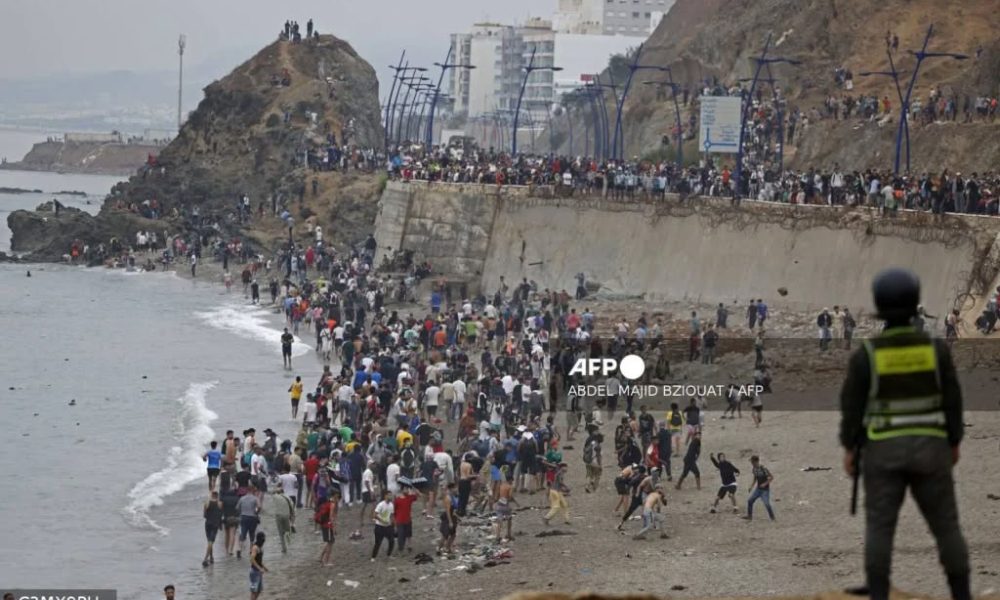 At least 18 migrants die as thousands enter Spanish enclave of Ceuta amid border crisis