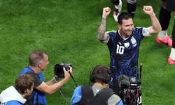 Messi magic sinks England, sends Argentina into World Cup final