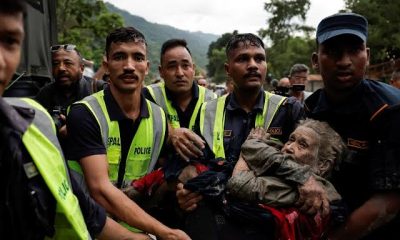 Nepal-Tibet flash flood disaster leaves more than 160 dead , hundreds missing