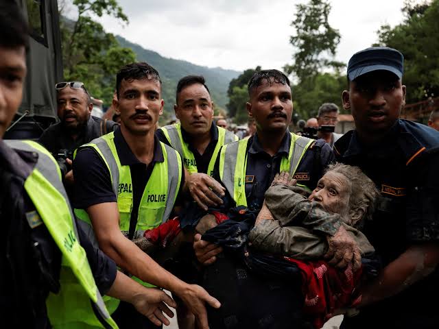 Nepal-Tibet flash flood disaster leaves more than 160 dead , hundreds missing